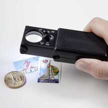 LED pull-out magnifier with UV lamp